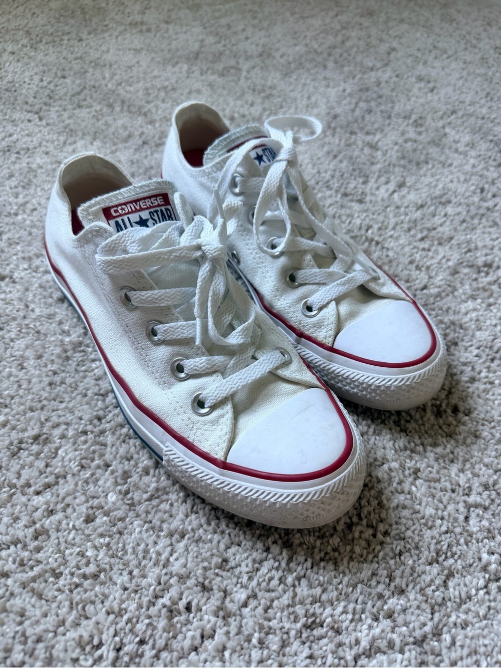 Converse White Low Top Sneakers with Red Trim